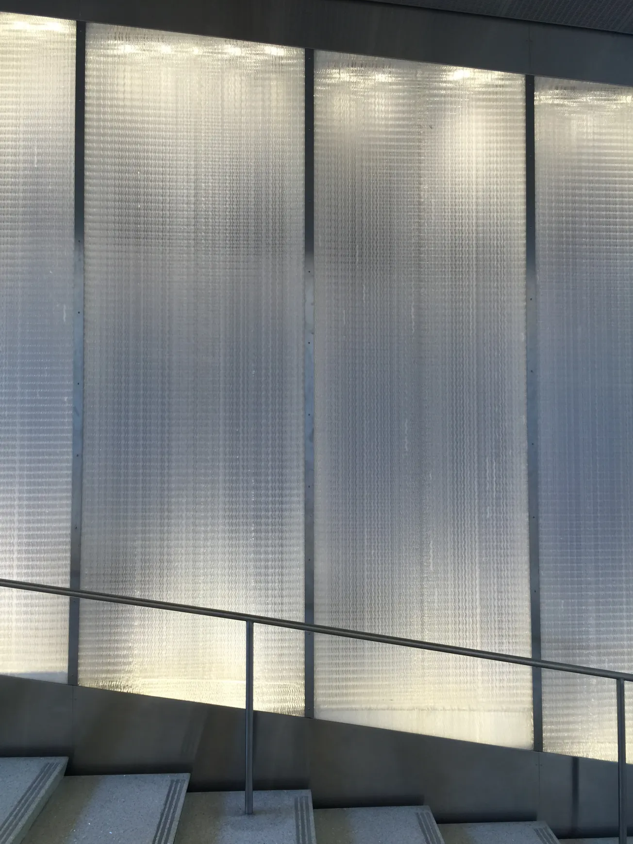 Close-up of moving metal panels on Ned Kahn’s Rain Portal sculpture