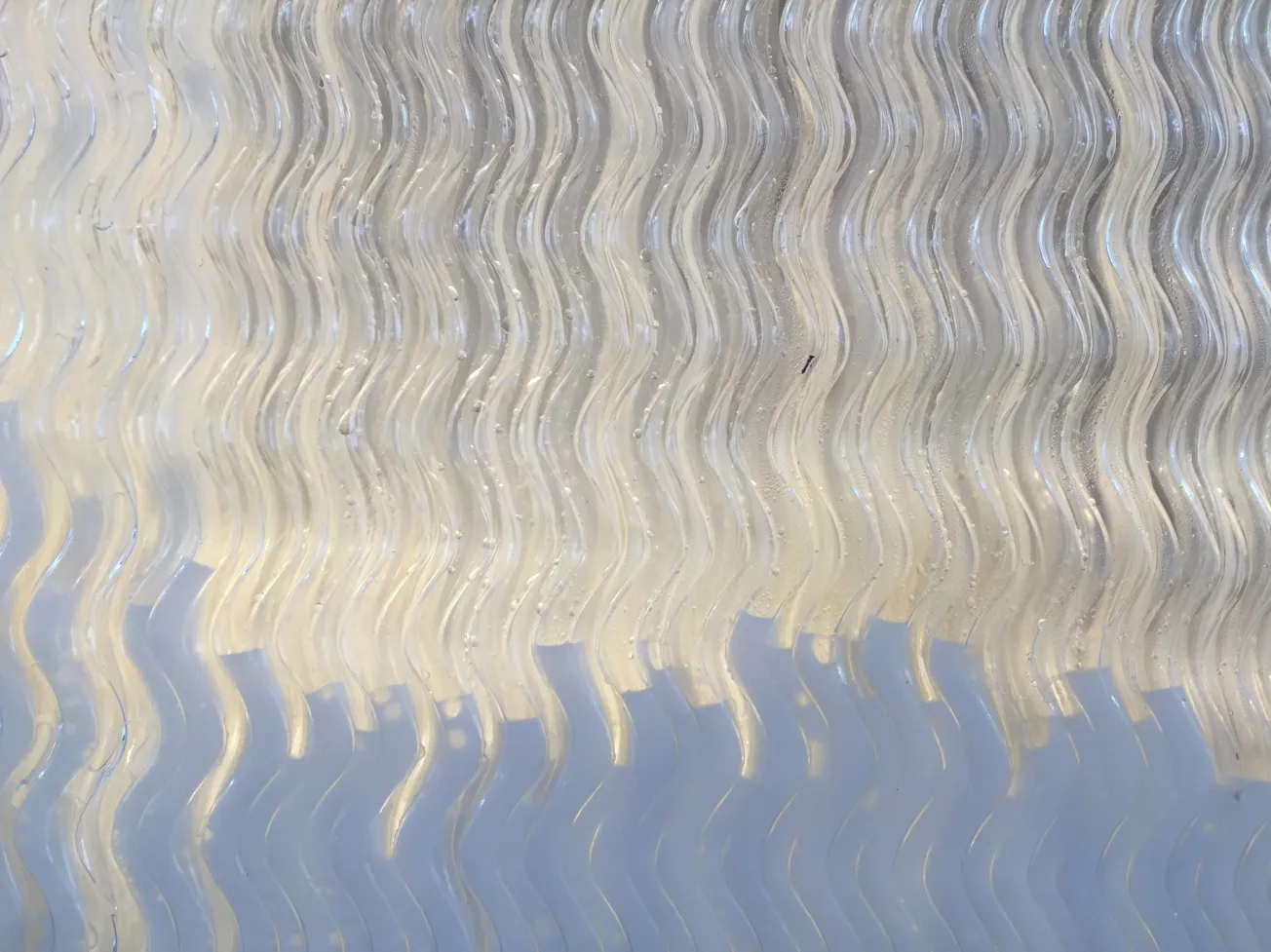 Close-up of moving metal panels on Ned Kahn’s Rain Portal sculpture
