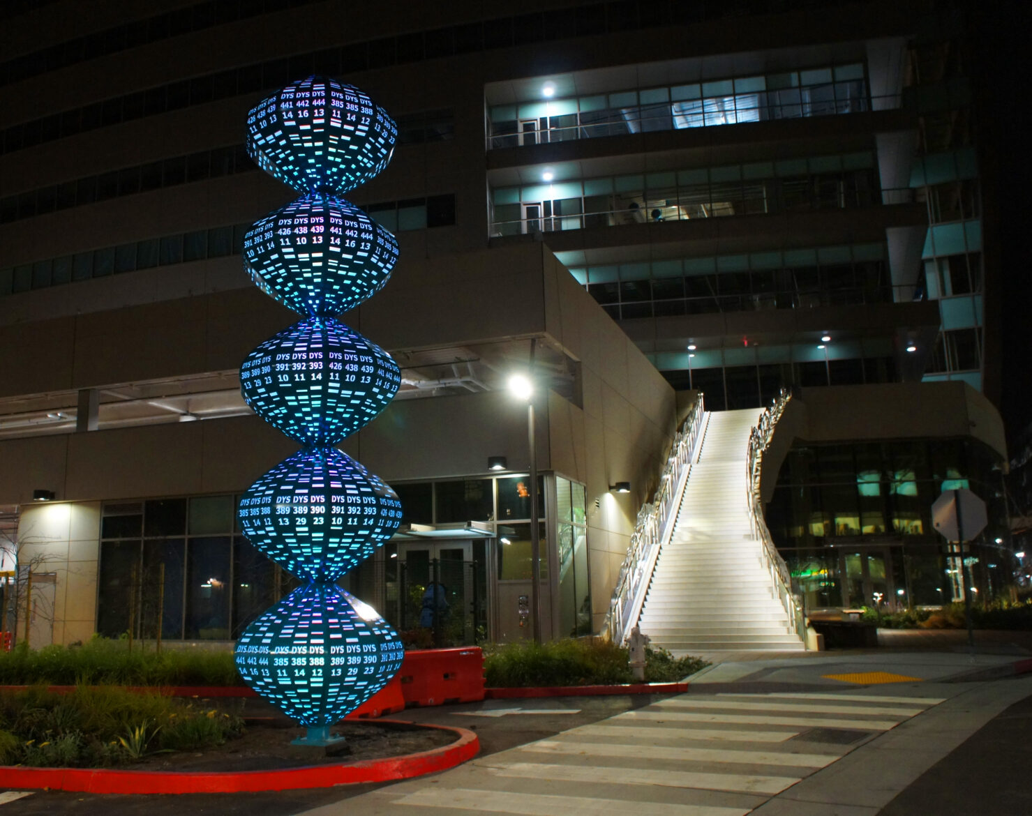 DNA lighted sculpture by Blessing Hancock fabricated & installed by Gizmo Art Production in Emeryville, CA