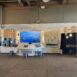 Custom interactive exhibit at the Seymour Marine Discovery Center featuring digital media displays, touchscreen stations, modular artifact cases, and laser-cut kelp-inspired graphics in a Monterey Bay–themed environment.